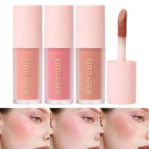 May include: Three tubes of liquid blush in shades of peach, pink, and nude, with a matching applicator. The tubes have a matte finish and a light pink cap. The text "BEAUTY GLAZED" is printed vertically on each tube.