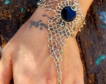 Hand bracelet with ring and black obsidian crystal, Bohemian jewelry in gold alpaca metal, Boho Chic style hand jewelry