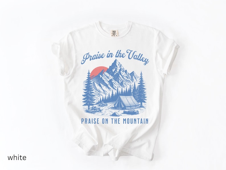 Elevation Brandon Lake Fan Shirt Praise in the Valley Praise on the Mountain Comfort Colors 1717 tee,tshirt in neutral colors trendy with praise in the valley in cursive font and praise on the mountain in a sans serif witha blue print of a mountain