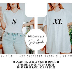 May include: Two women modeling a white Bella Canvas 3001 t-shirt in sizes S and XL. The size guide text is visible: Relaxed Fit, choose your normal size. Oversized Look, go up 2 sizes. Shirt Dress Look, go up 3 sizes.