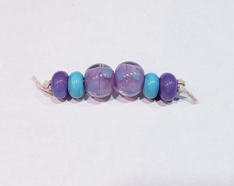 Rounds and spacers Purple and Turquoise Encased in clear Lampwork Bead Set  SRA SRAJD