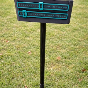 Marcador de Cornhole Slide con soportes para bebidas y teléfonos