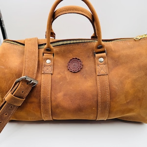 leather weekend bag(s)