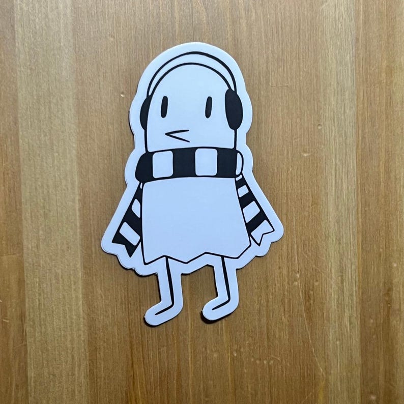 May include: A white ghost wearing black and white striped scarf and headphones. The ghost has a black outline and is standing on two legs.