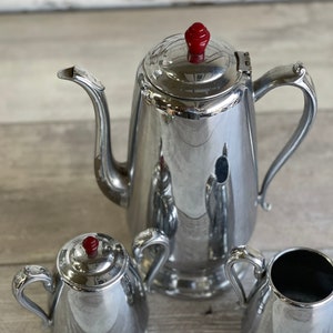 Vintage Chrome Tea Set: Stainless Teapot, Creamer & Sugar, Red Bakelite