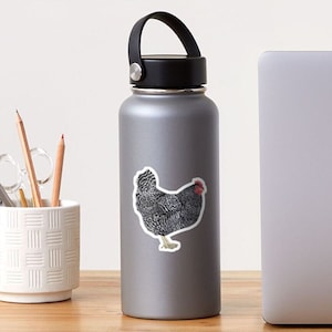 May include: A sticker featuring a detailed illustration of a chicken. The chicken has black and white speckled feathers, a red comb and wattle, and a yellow beak and feet. The sticker is on a gray water bottle.