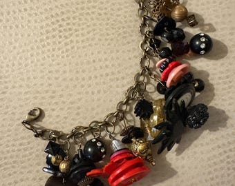Big fun bracelet with buttons and beads. Findings, clasp and headpins are brass.