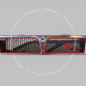 May include: A silver car grille with a black mesh center and red trim. The grille features the text "HF Integrale" in red and a circular emblem. The design is automotive-themed.