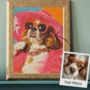 May include: A framed illustration of a dog wearing a pink hat, sunglasses, and a pink fur coat. The dog is holding a cigarette in its mouth. The image is in a gold frame. The text "Your Photo" is on a white polaroid frame.