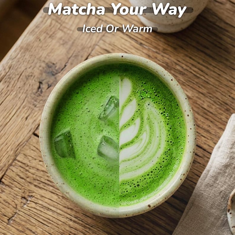 May include: A ceramic bowl of matcha tea, split in half to show two preparations. One side is a vibrant green with ice cubes, the other side has a white design. The text "Matcha Your Way" and "Iced Or Warm" is at the top.
