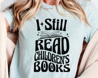 I Still Read Childrens Books Literary Shirt Bookworm Bookish Tshirt Reading Gift for Bookworm Librarian Gifts Stay Weird Be Kind Love Reader