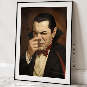 May include: A framed art print featuring a portrait of a pale individual with slicked-back dark hair, wearing a black suit, a cream-colored vest, and a red bow tie. The figure has a high-collared cape and is pinching their nose with one hand.