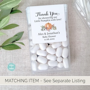 May include: A white favor box filled with white mints. The box has a label with the text "Thank You for showering our Little Pumpkin with love! Alex & Jonathan's Baby Shower 11.06.20xx". The label has a watercolor illustration of a pumpkin with fall leaves.