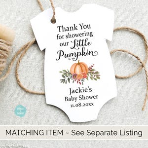 May include: White baby onesie shaped thank you tag with a pumpkin and fall leaves design. The text reads "Thank You for showering our Little Pumpkin" and "Jackie's Baby Shower 11.08.20XX".