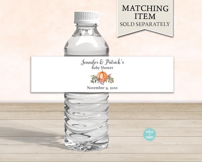 May include: Water bottle label with a fall theme. The label is white with black text that reads "Jennifer & Patrick's Baby Shower" and "November 9, 20xx". There is a watercolor illustration of a pumpkin with leaves and berries.