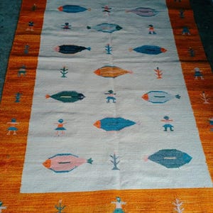 Handwoven Wool Dhurrie Rug with Fish & Human Motifs – Tribal Folk Art Design