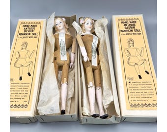 Paar originele vintage bisque-etalagepoppen met houten romp