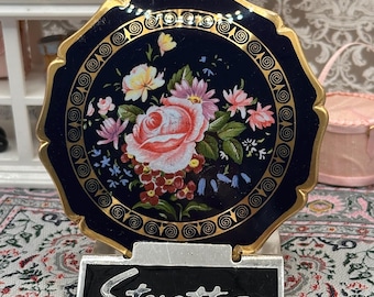 Estuche de polvos Stratton vintage – Esmalte floral azul marino, detalles dorados, década de 1950/60, estuche británico