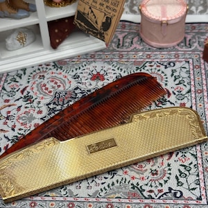 May include: A rectangular wooden sign, distressed for a rustic look, bearing the handwritten text "Welcome to our home". The sign is designed for welcoming guests and is suitable for both indoor and outdoor settings.