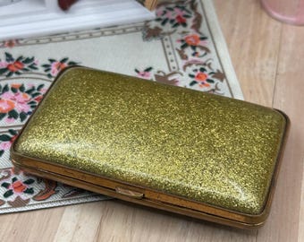 Porta-cigarros vintage Art Déco com glitter dourado, década de 1930, em plástico antigo, 8 cm