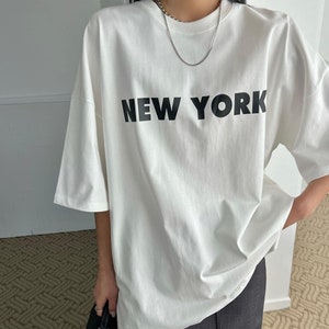 White t-shirt. Cotton white t-shirt. T-shirt women. White t-shirt for women. Oversized t-shirt. Cotton oversized t-shirt. T-shirt New York.