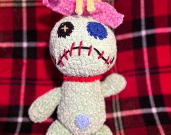 Muñeca Scrump de peluche de chenilla