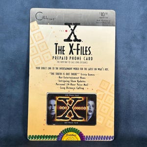 Tarjeta telefónica prepago de The X Files, de 1995, de Call Time, nueva y sellada