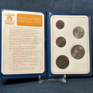 Cartera/juego de las primeras monedas decimales de Gran Bretaña
