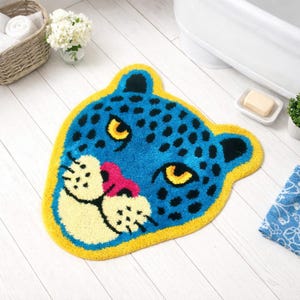 Alfombra de baño con estampado de leopardo azul, suave y absorbente.