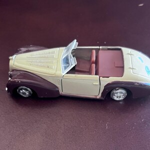 Vintage - Rolls Royce - Missing canopy - collectable toy, Cream And Maroon Diecast Convertible Sports Car Open Top Roadster With Chrome Trim