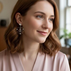 Vintage Silver Tone Openwork Heart Dangle Earrings With Rhinestone Accents - pierced Jewelry