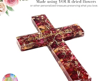 May include: A clear resin wall cross embedded with dried red rose petals and foliage. The surface features gold lettering that reads Christopher 1997 2024. Text above the cross states Handcrafted WALL CROSS Made using YOUR dried flowers.