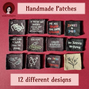 May include: A selection of 12 handmade patches, each with a unique design and text. The patches, in a rectangular shape, display messages such as "Racism is Poison" and "We All Bleed the Same Colour". Set against a red backdrop.