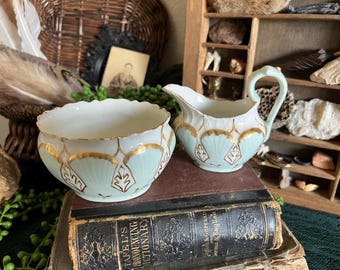 D & C France Limoges porcelain creamer and sugar set / light blue and white with gold accents
