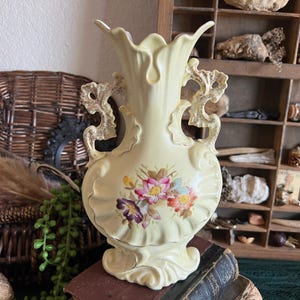 Victoria Carlsbad Austira ornate yellow ceramic vase with gold accents