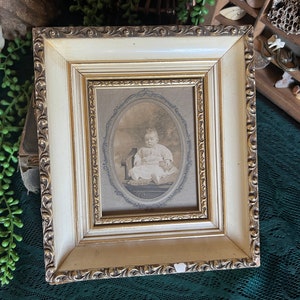 Antique framed photo of baby