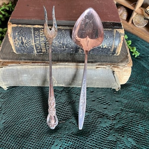 Vintage Rogers Bros silver serving fork and International deep silver serving spoon