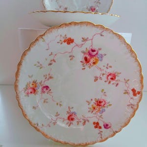 Antique Aynsley bone china Victorian saucers.