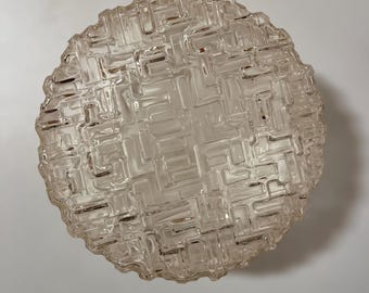 May include: A clear glass ceiling light fixture with a geometric pattern.