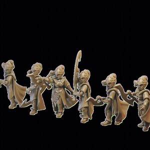 May include: A set of eight miniature figurines, each depicting a fantasy character with a unique pose and weapon. The figurines are made of a light brown plastic and are painted in a muted brown color.