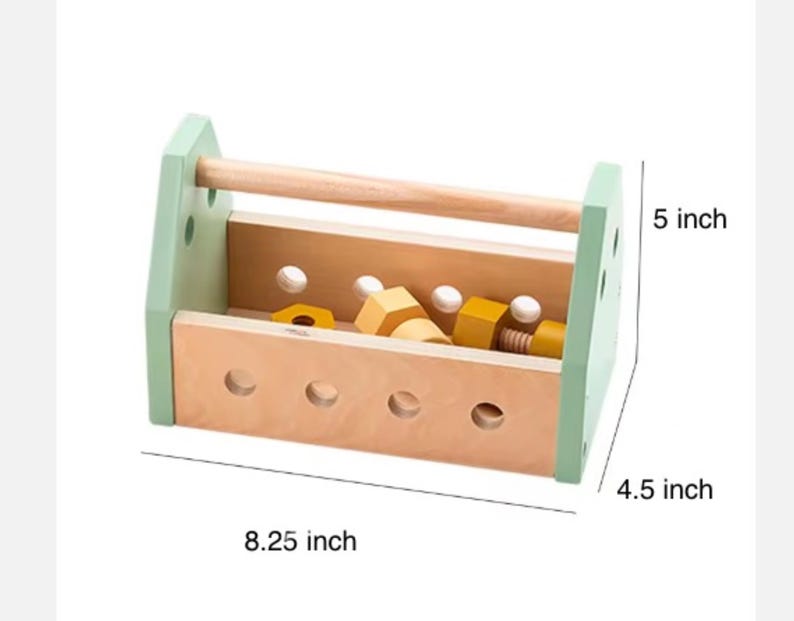 May include: A wooden toy toolbox with light green side panels and a natural wood handle. The box features circular holes and contains yellow wooden nuts and bolts. Dimensions are 8.25 inches in length, 4.5 inches in width, and 5 inches in height.