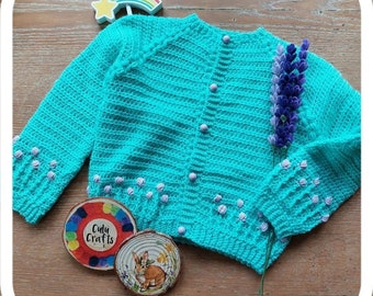 Handcrocheted girls hand embroidered spring meadow cardigan, mint green and lilac purple, acrylic blend