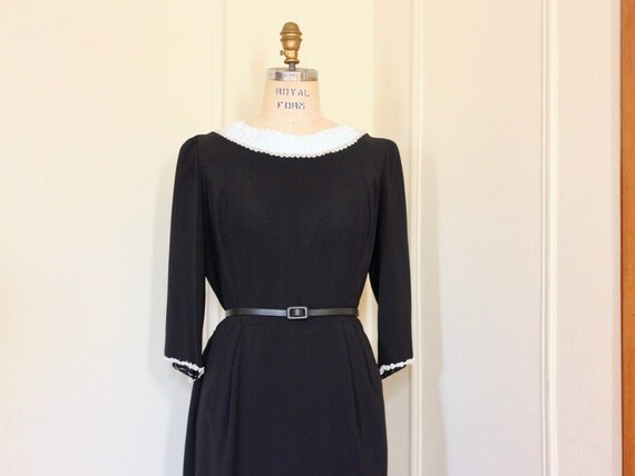 knee length dresses for ladies Asymmetrical nude dress with gold metal detail on the collar main image 0