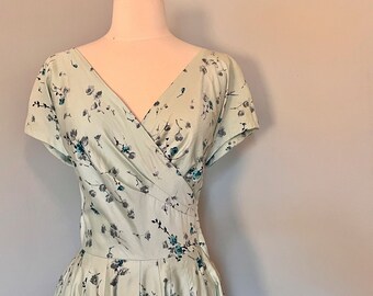 vintage 1950s ice blue faux wrap Party Dress with teal & lilac roses - fit 'n flair, midi length, metal side zipper - size small