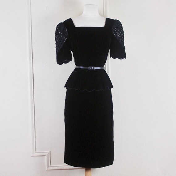 black dress with peplum waist