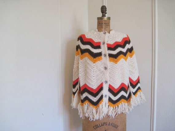 1970s Poncho - cream, vermilion, brown, and orange