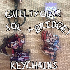 Sol Badguy and Bridget Guilt Gear Double Sided Keychains