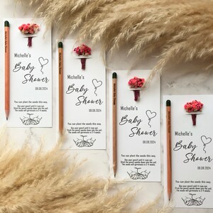 The seeded pencil is on a personalized card. There are also colorful flowers on the card.