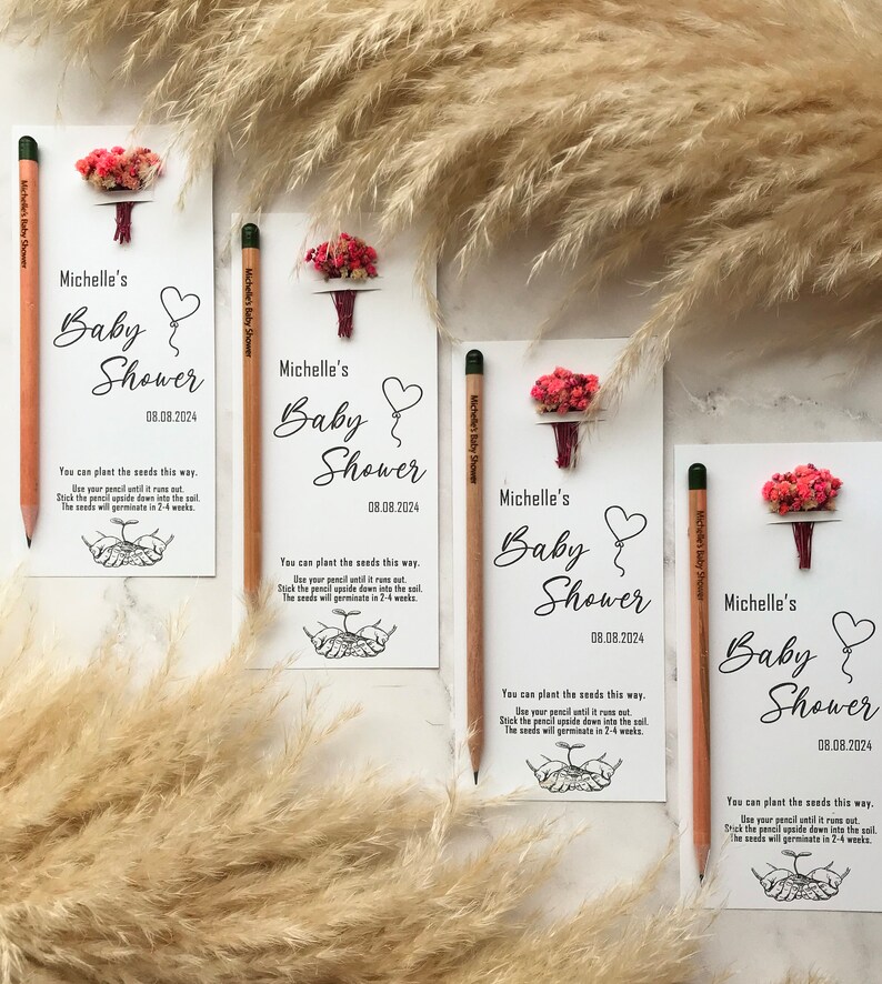 The seeded pencil is on a personalized card. There are also colorful flowers on the card.
