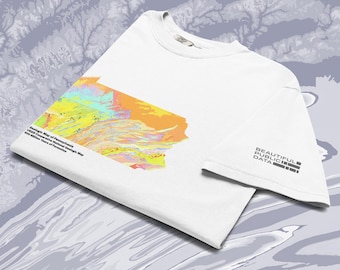 May include: A white short-sleeve t-shirt featuring a colorful geologic map of Pennsylvania on the front with the text Geologic Map of Pennsylvania USGS Cooperative National Geologic Map 500 Million Years of Formation and Beautiful Public Data.
